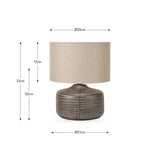 Kai Earth Brown Textured Ceramic Table Lamp with a beige linen drum shade, shown with dimension markers: 33cm total height, 26cm shade diameter, 21cm base diameter, on a white background.