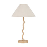 Palau Rattan Wave Table Lamp with a natural rattan wavy stem, round base, and cone-shaped linen shade, shown on a plain white background.