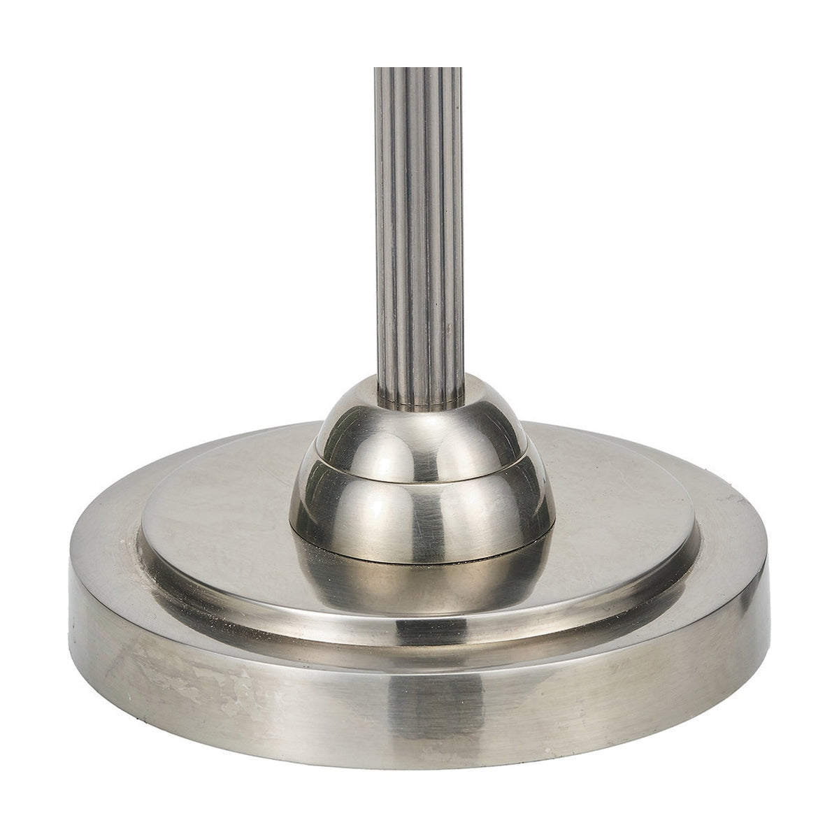 Salvatore table lamp base in antique silver brass, close-up of the tiered round base and fluted stem on a plain white background.