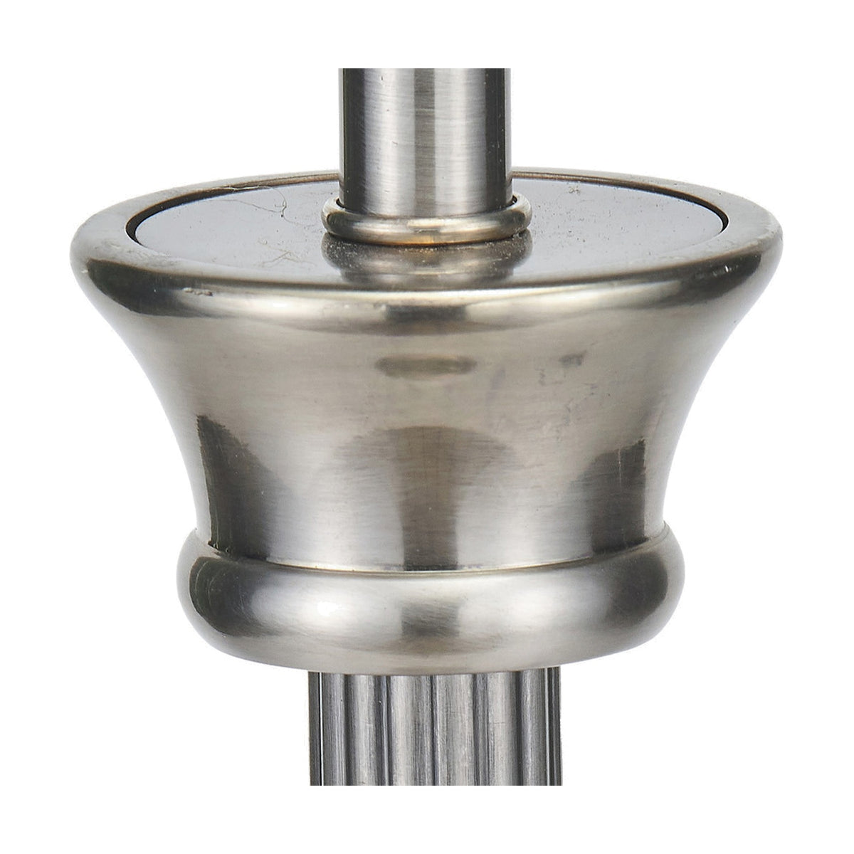 Close-up of the Salvatore table lamp base in antique silver metal, showing the fluted stem and rounded urn-shaped fitting against a plain white background.