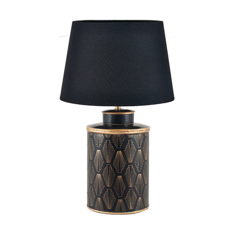Chrysler Black Art Deco table lamp with cylindrical black and gold patterned ceramic base and black tapered fabric shade, shown on a plain white background.