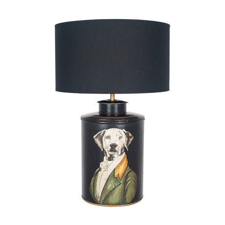 Pointer Black Hand Painted Dog Table Lamp with a cylindrical black base featuring a painted dog in a green coat, topped with a black cotton mix drum shade, on a plain white background.