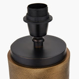 Close-up of the Aurelio Black Textured Table Lamp Base, showing a black E27 bulb holder atop a matte black disc, set on a knurled brass cylindrical base, on a plain white background.