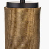 Close-up of the Aurelio Black Textured Table Lamp Base, 43cm, showing a knurled brass cylindrical body beneath a matte black cap fitting, on a plain white background.