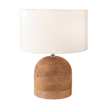 Nelu table lamp with a natural engraved wood dome base and white handloom cylinder shade, shown against a plain white background.