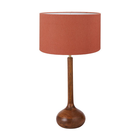 Toma table lamp with a tall oiled wood neck, round bulbous wood base, and terracotta handloom drum shade, shown on a plain white background.