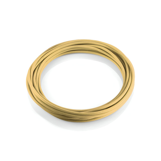 A Next Fabric Lighting Cable 5m - Brass, coiled in a circular shape on a plain white background, provides vintage lighting solutions with an elegant touch.