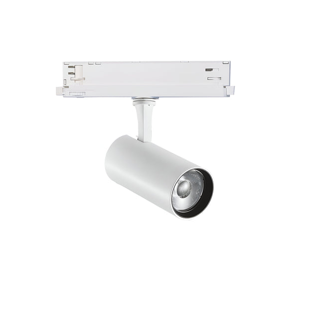 The Ignis LED Three Phase Track Spotlight, featuring a 15W power output and CRI90 for accurate color rendering, is elegantly designed with a white cylindrical shape. It is mounted on a straight white track and supports 1-10V dimming, providing optimal directional lighting with its angled downward positioning.