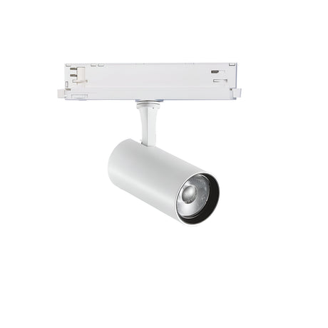The Ignis Dimmable LED Three Phase Track Spotlight, with its sleek and minimalist cylindrical design in white, is mounted on a rectangular track. With 15W power and CRI90 for excellent color accuracy, this indoor spotlight is angled downward to provide focused lighting.