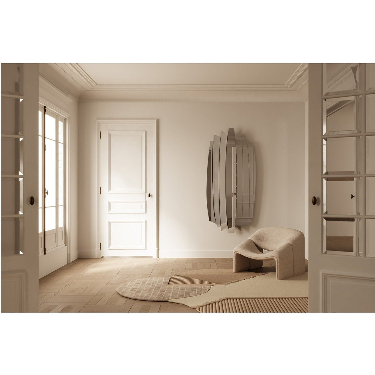 Tutti Faceted 7 Blade Full Length Mirror, 190cm, with irregular blade-edge outline in polished clear glass, mounted on a wall beside a beige armchair in a neutral hallway.