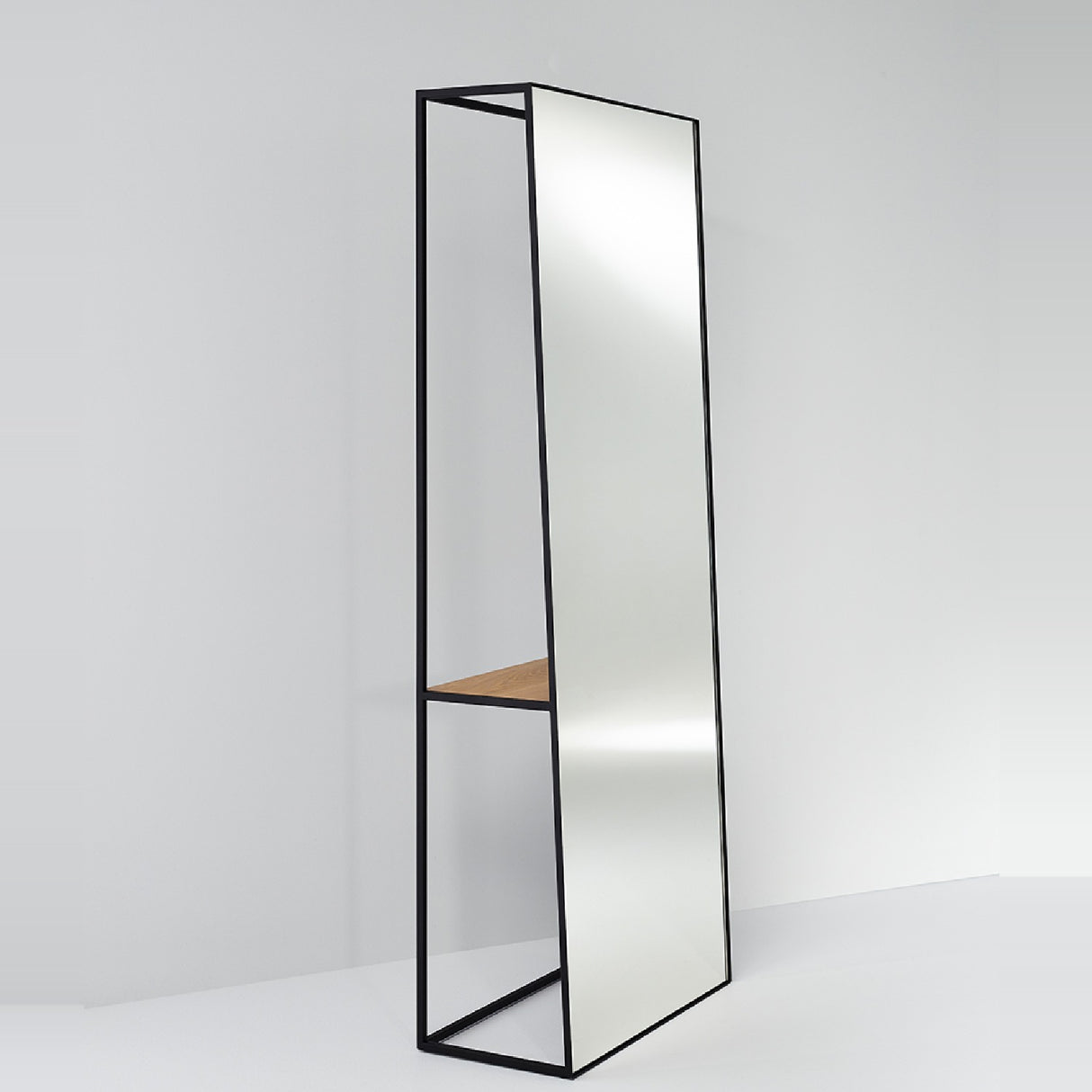 Chassis XL Oak Shelf Free Standing Mirror 170cm in Black, an open black metal frame cheval mirror with a solid oak shelf inset, shown against a plain light grey background.