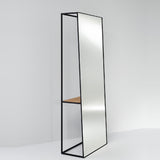Chassis XL Oak Shelf Free Standing Mirror 170cm in Black, an open black metal frame cheval mirror with a solid oak shelf inset, shown against a plain light grey background.