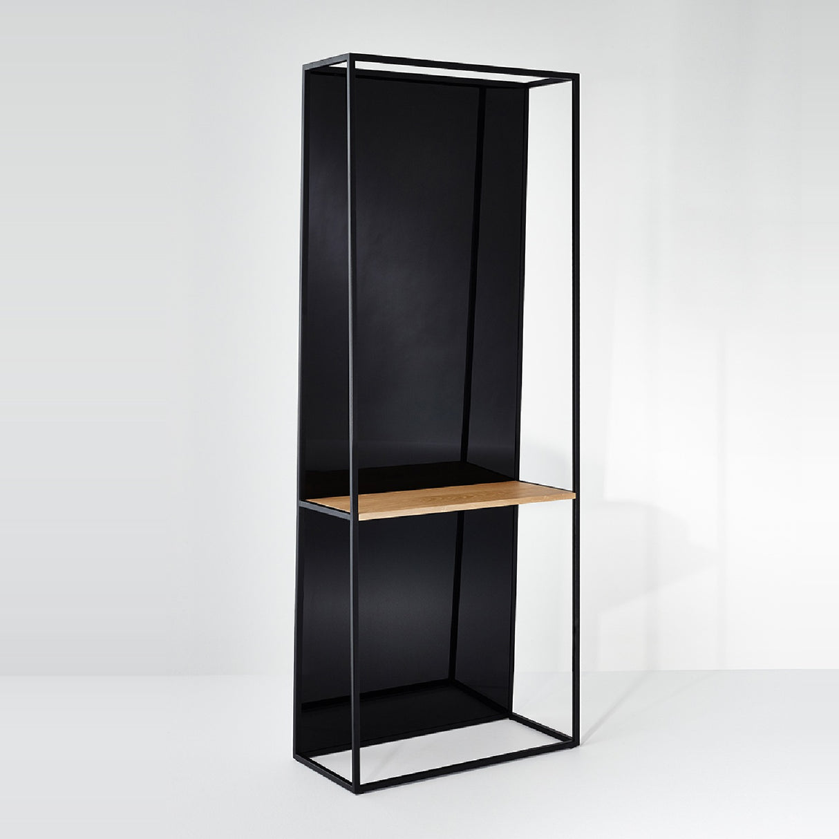 Chassis XL Oak Shelf Free Standing Mirror in black, an open metal frame cheval mirror 170cm high with a solid oak shelf and splayed floor base, shown against a plain white background.