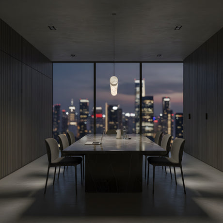 A modern conference room with a long table, six chairs, and a laptop overlooks the city skyline at dusk. Above the table hangs the Zareon LED Small Linear Alabaster Suspension Light – Soft White, illuminating the minimalist interior.