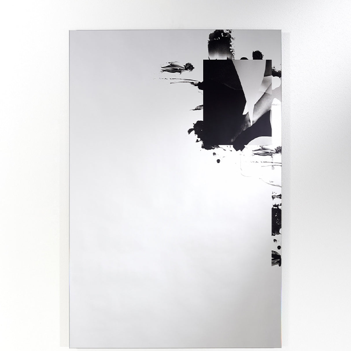 Connect III frameless rectangular wall mirror 105cm with a torn black printed form and photographic image inset, mounted on a plain white wall.