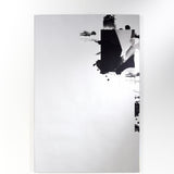 Connect III frameless rectangular wall mirror 105cm with a torn black printed form and photographic image inset, mounted on a plain white wall.