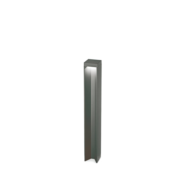 The Viritis Outdoor LED Bollard Light 12W 3000K in Anthracite stands tall against a plain white backdrop. Featuring a smooth, reflective surface and sharp, clean lines, it captures the essence of modern design. Its weather-resistant construction ensures both style and durability, making it perfect for adding an elegant touch to any landscape with anthracite lighting.