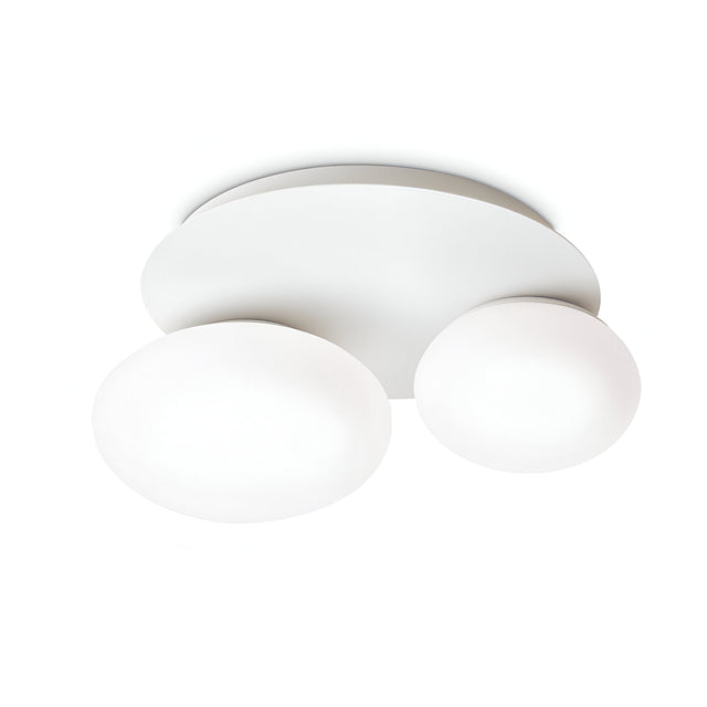 The Halion 2 Light Flush - White is a minimalist ceiling light fixture with two circular white frosted glass shades set on a round base, featuring an elegant white finish. Its modern design makes it ideal for contemporary interiors.