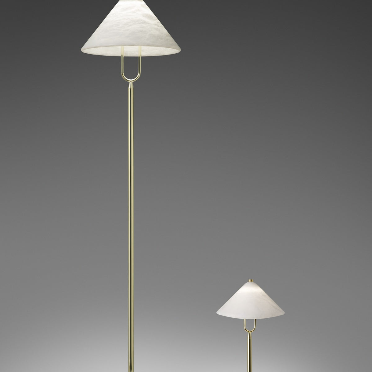 Fuji LED Alabaster Floor Lamp in polished brass, shown in two heights with conical alabaster shades on slim stems and U-shaped yokes, set against a grey background.