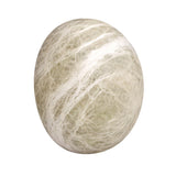 A close-up of the Orvani LED Large Oval Alabaster Wall Light in Soft White, featuring a polished, pale greenish-gray surface with marble-like white streaks, showcased on a white background.