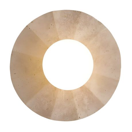 The Caldera 1 Light Large Disc Travertine Wall Light in light beige, featuring a circular shape with a smooth travertine finish and central hole, is displayed against a white background.