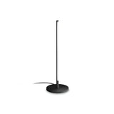 Introducing the Celestia LED Table Lamp - Black, showcasing a sleek, black finish and a slender vertical light strip on a circular base against a white background. This lamp embodies modern lighting elegance and includes an extending power cord from the base.