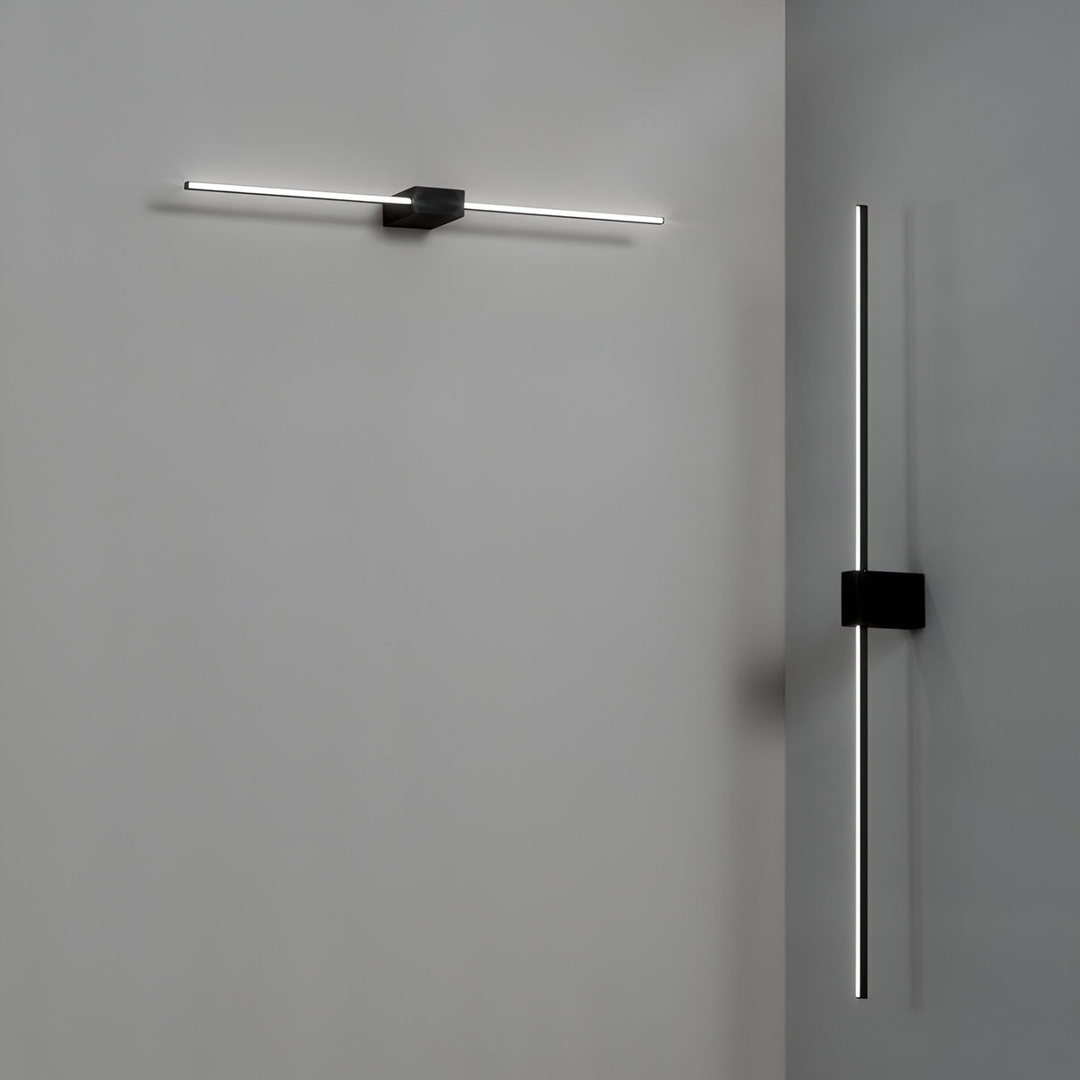 Product Description: The Helion LED Picture Light 20.5W 3000K in Black, measuring 115cm, offers a minimalist wall installation with its sleek design. Featuring one horizontal and one vertical light both mounted on matte black finishes, this fixture adds a modern touch while subtly illuminating your artwork against a grey wall.