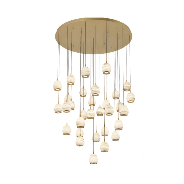 The Aurevia 31 Light LED Drop Alabaster Cluster Pendant Light in brushed brass features a round, flat base and multiple white pendants suspended at varying lengths, creating a sculptural, cascading chandelier effect.