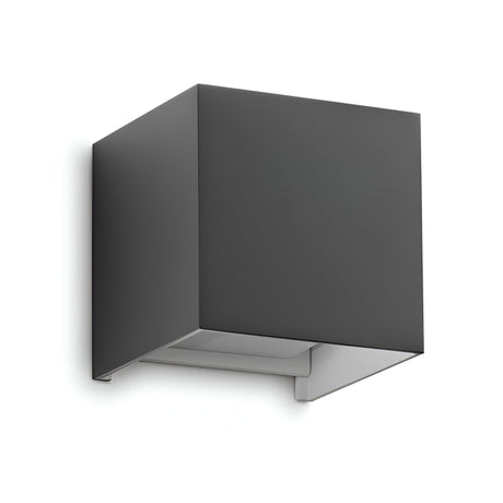 The Flareon LED Outdoor 12W 3000K Wall Light, featuring a compact 10cm grey cube design, offers a minimalist aesthetic ideal for contemporary exteriors. Its open bottom design directs light downward, improving energy efficiency while providing a stylish addition to your outdoor space.