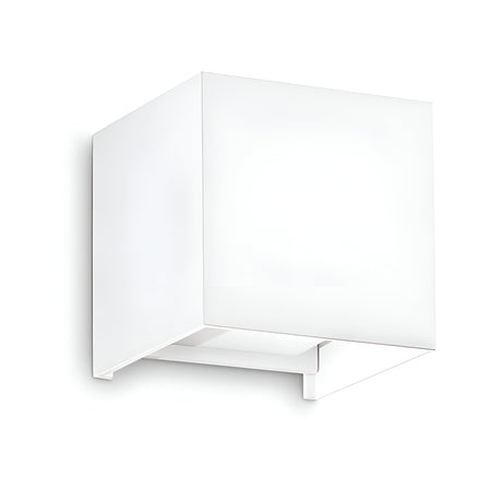 The Flareon LED Outdoor 12W 3000K Wall Light in white, featuring a minimalist cube-shaped design, is mounted on a white wall. Its modern geometric form emphasizes simplicity and contemporary style. This light integrates energy-efficient LED technology with sleek aesthetics, offering an elegant enhancement to any space.