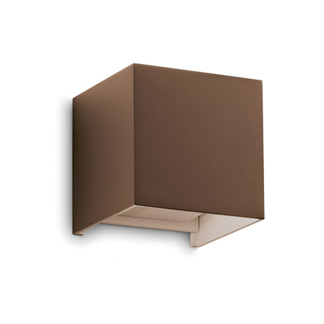 The Flareon LED Outdoor 12W Wall Light in brown features a sleek, cube-shaped design with minimalist appeal. Made from durable metal, it offers energy efficiency and emits a warm 3000K glow downwards, enhancing its modern elegance against a plain background.