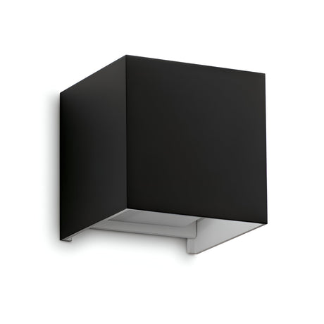 Introducing the Flareon LED Outdoor 12W 3000K Wall Light in black, featuring a minimalist cubic design perfect for wall mounting. This 10cm light directs illumination downward, embodying a sleek and contemporary style while offering energy-efficient lighting for any space.