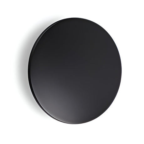 A round, black, glossy wall clock with a minimalist design and no visible numbers or hands is paired with the sleek Eclipseax Outdoor LED Wall Light 9W 3000K - Black, 18cm against a plain white background, seamlessly blending modern aesthetics with functionality.