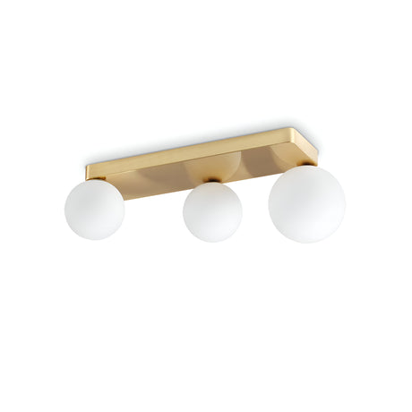 Presenting the Luxis 3 Light Wall Light - Gold: a modern lighting fixture characterized by three spherical frosted glass globes mounted on a rectangular brass base. This sleek gold wall light offers a minimalist, contemporary design ideal for diverse interior spaces.