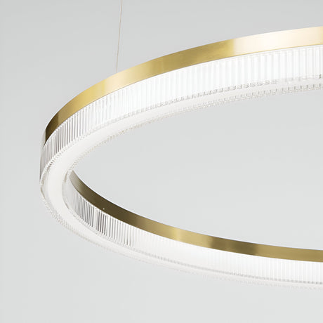 A stylish Soltra LED Light Suspension 30W 3000K chandelier in a brass finish hangs against a plain white background. Its contemporary design showcases minimalistic lines, making it an ideal choice for modern interiors and emphasizing its chic aesthetic.