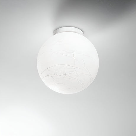 The Gleonis Ceiling Light - White, 30cm is a round ceiling fixture with a smooth, marble-like texture that emits a soft glow and mounts elegantly on a simple white ceiling. Designed for contemporary decor, this minimalistic piece adds sophistication and is dimmable for perfect ambiance control.