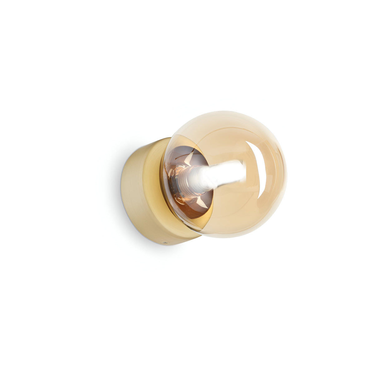 The Solana Ceiling & Wall Light - Brass features a contemporary round gold base with a satin brass finish. Its clear blown glass diffuser softly illuminates the space, creating an elegant atmosphere.