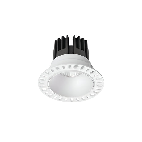 The Sally LED Trimlees Round Recessed Downlight 11W 3000K - White, with its contemporary circular design featuring a white trim and a black heat sink, is showcased against a plain white background. This fixture employs COB LED technology and includes small ventilation holes around the edge, enhancing ambient lighting in any space.