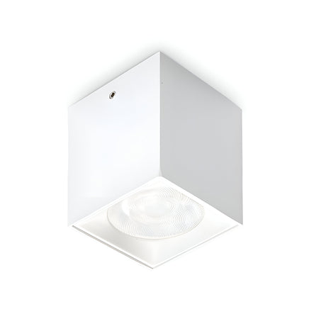The Solace LED Square Downlight 4W 3000K - White embodies a minimalistic aesthetic, featuring a sleek geometric design with a recessed bulb elegantly mounted on a white ceiling.