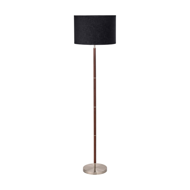 Gianni floor lamp, 157cm tall, with a black drum fabric shade and slender wood-effect stem on a round brushed silver base, shown on a plain white background.
