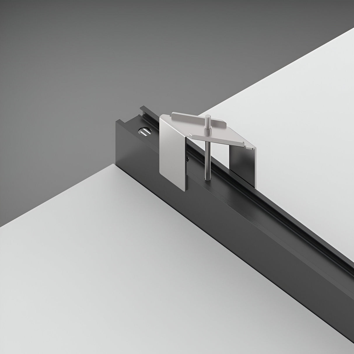 The Luxeon Slim Recessed Magnetic Track 2m - Black showcases a contemporary design with its streamlined, minimalist aluminium structure composed of geometric shapes and polished surfaces. It features a black rectangular base, a vertical metal rod, a triangular component, and a square flat plate, all highlighted against a gray backdrop.