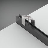 The Luxeon Slim Recessed Magnetic Track 2m - Black showcases a contemporary design with its streamlined, minimalist aluminium structure composed of geometric shapes and polished surfaces. It features a black rectangular base, a vertical metal rod, a triangular component, and a square flat plate, all highlighted against a gray backdrop.