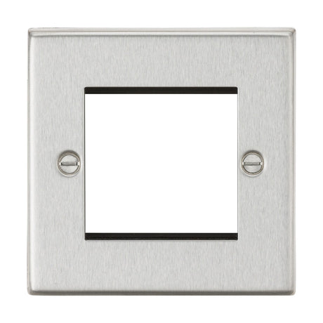 The 2 Gang Modular Faceplate - Brushed Chrome (Square Edge) features a metallic, rectangular design with a central square cutout and two visible screws on each side for installation, ideal for Euro module setups. Its surface showcases a brushed chrome finish, prepared for TV/DATA/HDMI/USB/TEL installations.