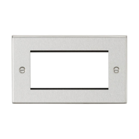 The 4 Gang Modular Faceplate in brushed chrome features a rectangular design with a central cutout and two screw holes, making it an ideal choice for covering light switches or outlets. Its sleek brushed chrome finish enhances TV installations or euro module setups.