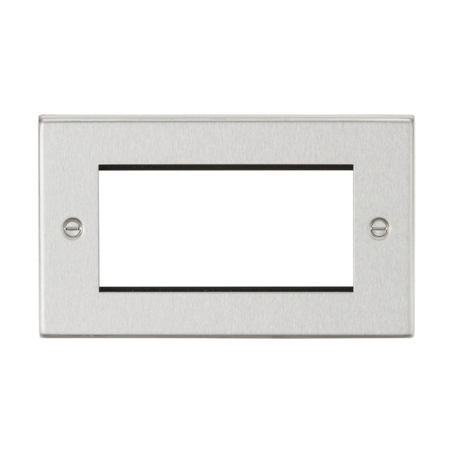 The 4 Gang Modular Faceplate in brushed chrome features a rectangular design with a central cutout and two screw holes, making it an ideal choice for covering light switches or outlets. Its sleek brushed chrome finish enhances TV installations or euro module setups.