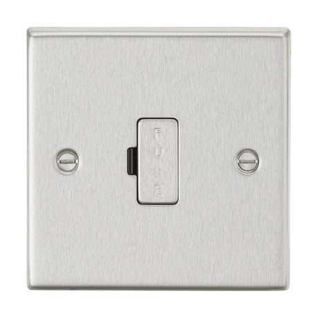 A close-up of the 13A Fused Spur Unit in brushed chrome highlights its square edge design with an integrated fuse. The surface is elegantly finished, featuring two screws on either side, and the fuse is prominently labeled vertically at the center.
