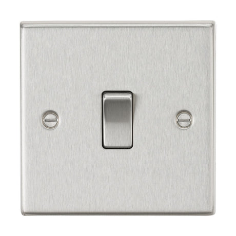 A 20A 1 Gang DP Switch - Brushed Chrome (Square Edge) is centered on the wall, featuring a single toggle in the middle. The brushed chrome plate has a sleek metallic finish, with two neatly aligned screws symmetrically placed on each side of the switch.
