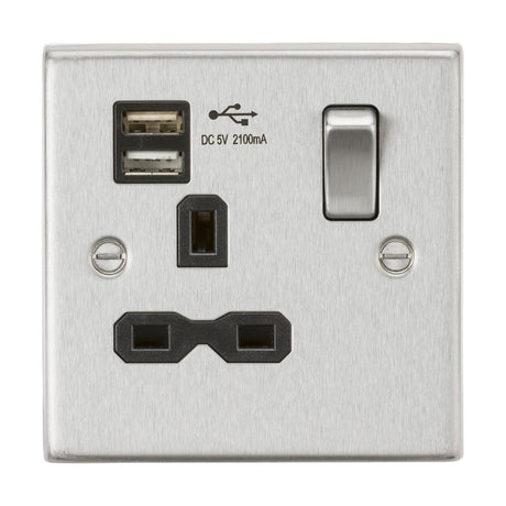 This modern home features a brushed chrome electrical outlet, known as the 13A 1 Gang SP Switched Socket with Dual USB, designed with a single socket, a double USB charger port labeled DC 5V 2100mA, and a convenient switch on the right side.