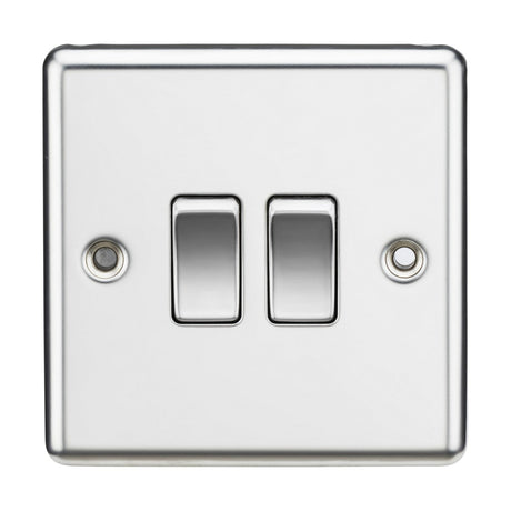 A 10AX 2 Gang 2-Way Switch in polished chrome with a sleek rounded edge design is showcased on a white background, featuring two rectangular rocker switches and two screw holes for easy mounting.