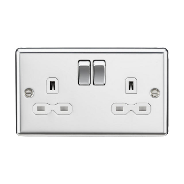 The 13A 2 Gang DP Switched Socket with Twin Earths offers two three-pin plug outlets within a rectangular design, exhibiting a polished chrome finish with a white insert and rounded edge. This combination enhances contemporary design aesthetics, delivering both sleekness and modernity.